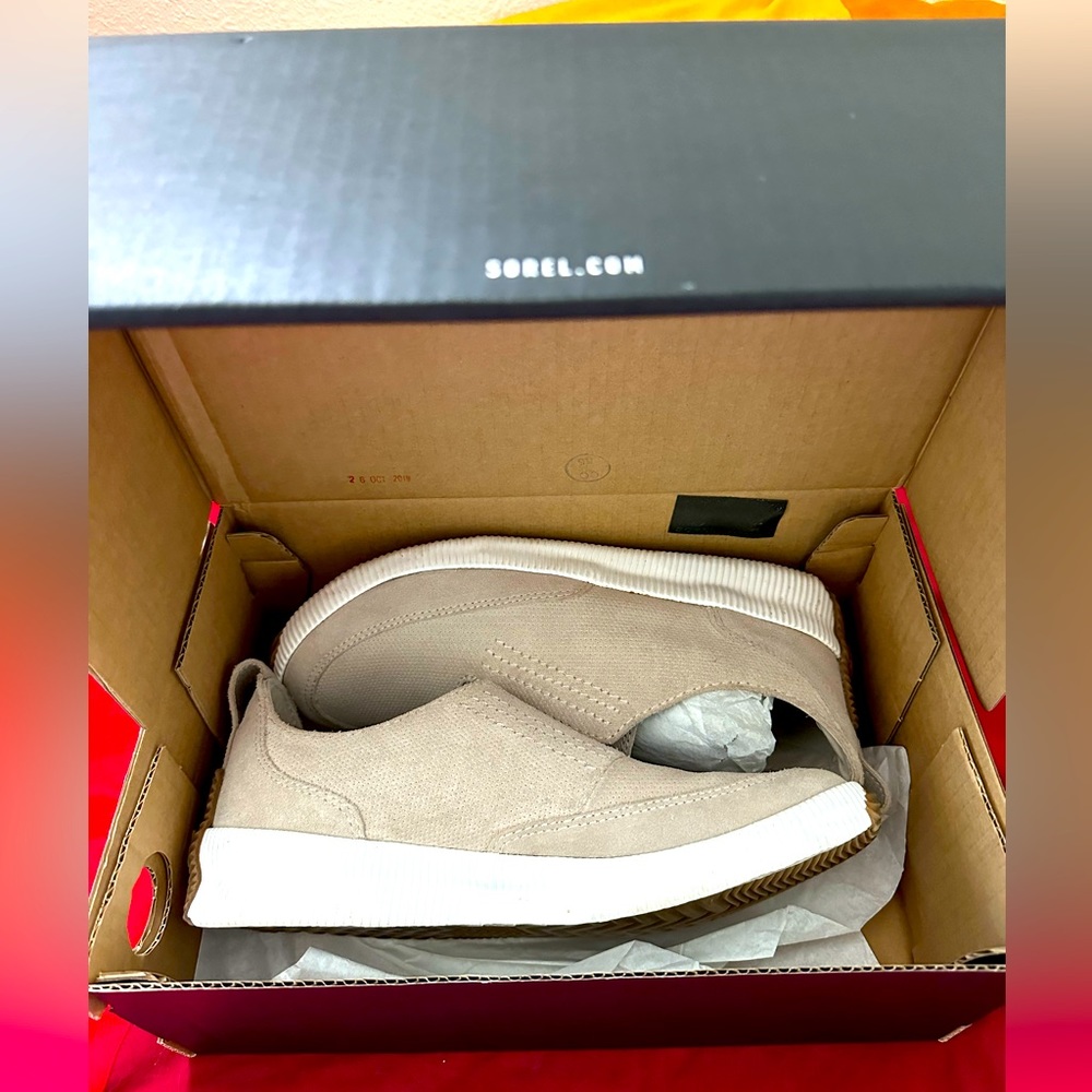 OUT N ABOUT PLUS SLIP ON , by SOREL. Soft Taupe. Size 9.
